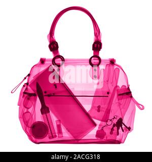 Handbag. Coloured X-ray of a handbag and its contents. Stock Photo