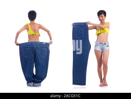 The woman in dieting concept with big jeans Stock Photo