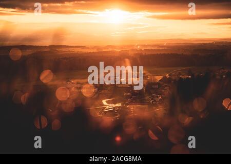Dramatic sunset over rural village scene in Austrian Alps near Salzburg, Austria Stock Photo