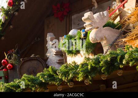Christmas decoration on the roof of a stand on the Christmas market in Germany Stock Photo