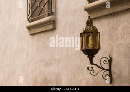 Vintage Old Street Classic Iron Lantern On The House Wall, Close Up Stock Photo