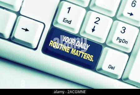 Handwriting text Your Daily Routine Matters. Conceptual photo Have good habits to live a healthy life White pc keyboard with empty note paper above wh Stock Photo