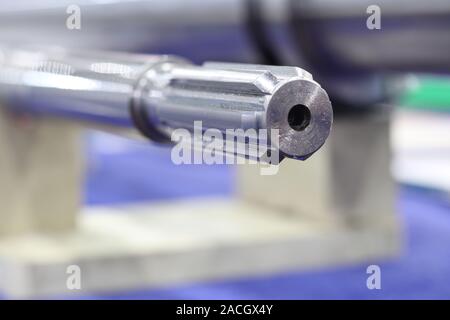 Screw press parts for plastic injection machine ; selective focus Stock Photo