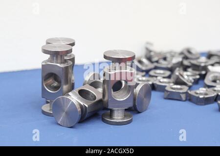 small machined parts manufacturing process ; tapping Stock Photo
