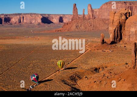 An aerial view hot air balloons preparing to launch in the Monument Valley Balloon Festival in the Monument Valley Navajo Tribal Park in Arizona. Stock Photo