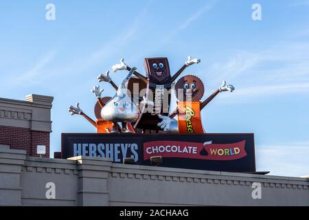 Hershey, PA / USA - November 26, 2019:  The iconic Hershey’s Chocolate World Entrance Sign with Candy Characters. Stock Photo