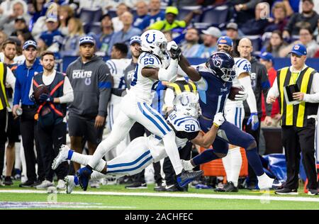 December 01, 2019: Tennessee Titans wide receiver A.J. BrownÊ(11) runs with the ball as Indianapolis Colts linebacker Anthony Walker (50) and Indianapolis Colts free safety Malik Hooker (29) pursue during NFL football game action between the Tennessee Titans and the Indianapolis Colts at Lucas Oil Stadium in Indianapolis, Indiana. Tennessee defeated Indianapolis 31-17. John Mersits/CSM. Stock Photo