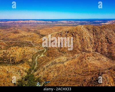 Aerial image of Standley Chasm and the surrounding West MacDonnell Ranges in the Northern Territory following the destruction of a recent bushfire. Stock Photo