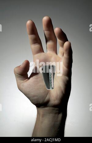 Mechanical human hand, conceptual image. Stock Photo