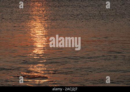 See night landscape with moonlight path on the water.Sunset. Background. Stock Photo