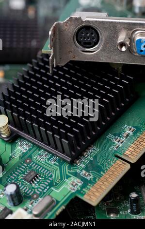 Electronic scrap. Pile of discarded computer components and other electronic waste. Modern electronic equipment contains many potentially polluting su Stock Photo