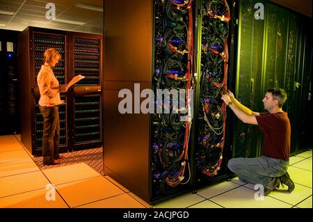 Hyperion supercomputer. Researchers working on units of the Hyperion supercomputer. This is a next-generation supercomputer based on Linux clusters, b Stock Photo