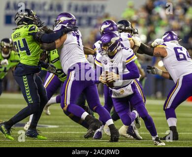 Seattle, United States. 2nd Dec, 2019. Minnesota Vikings quarterback Kirk Cousins (8) rolls out looking to pass against the Seattle Seahawks during the first quarter at CenturyLink Field in a Monday Night Football game on December 2, 2019 in Seattle, Washington. The Seahawks beat the Vikings 37-30. Photo by Jim Bryant/UPI Credit: UPI/Alamy Live News Stock Photo