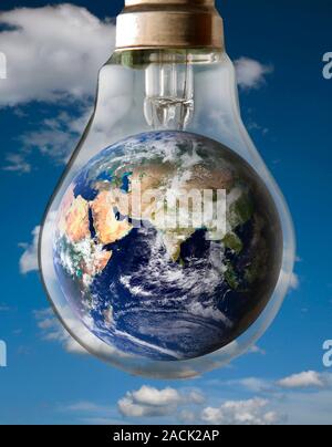 Global warming, conceptual image. Computer artwork of the Earth inside an incandescent lightbulb representing the effect of energy usage on the global Stock Photo
