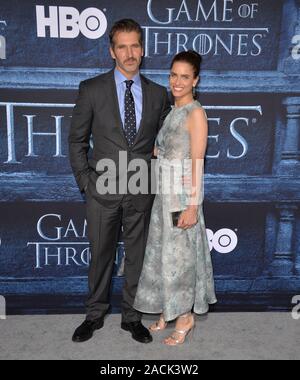 LOS ANGELES, CA. April 10, 2016: Actress Amanda Peet & husband writer David Benioff at the season 6 premiere of Game of Thrones at the TCL Chinese Theatre, Hollywood. © 2016 Paul Smith / Featureflash Stock Photo