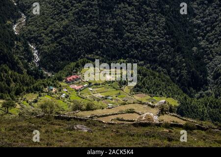 Aerial view on a small village with terrace fields Stock Photo