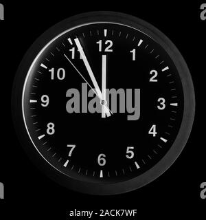 5 to 12 clock concept on black background Stock Photo