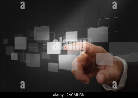 hand pushing on a touch screen Stock Photo