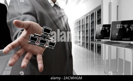 Business man hand shows pixel 3d network icon Stock Photo