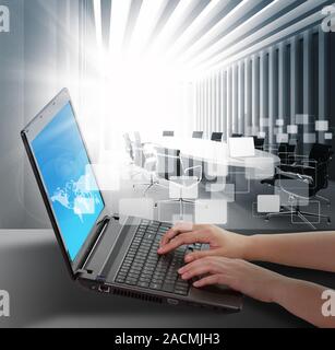 female hands typing on a laptop Stock Photo