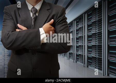 Business man engineer in data center server room Stock Photo