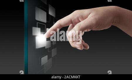 hand working on modern technology Stock Photo