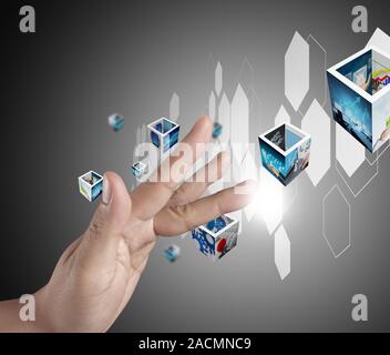 hand pushing on a touch screen interface Stock Photo