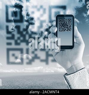 Scanning Qr code with mobile smart phone Stock Photo
