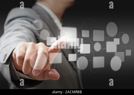 hand pushing on touch screen interface Stock Photo
