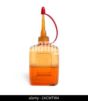 Sewing machine oil in bottle. Isolated on white background Stock Photo
