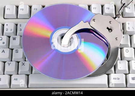 Software piracy, conceptual image. Image representing the illegal copying of computer software and other data. Stock Photo