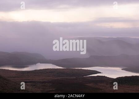 Near Ffair Rhos, Ceredigion, Wales, UK 03rd December 2019 Mist rising above Teifi pools on the Cambrian mountains as the weather turns slightly milder this morning. Credit: Ian Jones/Alamy Live News Stock Photo