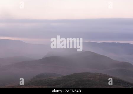 Near Ffair Rhos, Ceredigion, Wales, UK 03rd December 2019 Mist rising on the Cambrian Mountains as the weather turns slightly milder this morning. Credit: Ian Jones/Alamy Live News Stock Photo