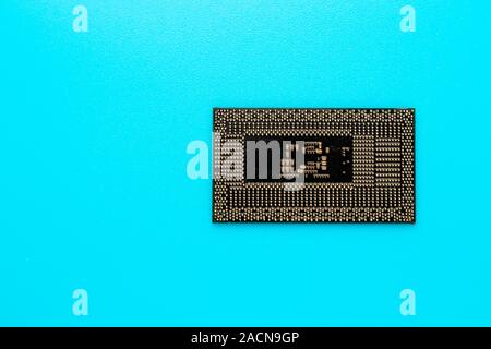 Processor, cpu. Microprocessor of pc. Microchip of computer on a turquoise background. Technology concept. Stock Photo