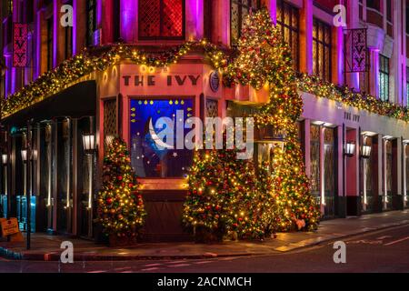 LONDON, UK - DECEMBER, 01 2019: The Ivy restaurant in West Street, Covent Garden is decorated for Christmas. Stock Photo