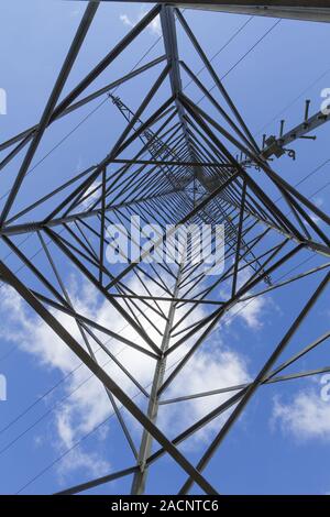 Close-up view of a high voltage electrical transmission tower featuring ...