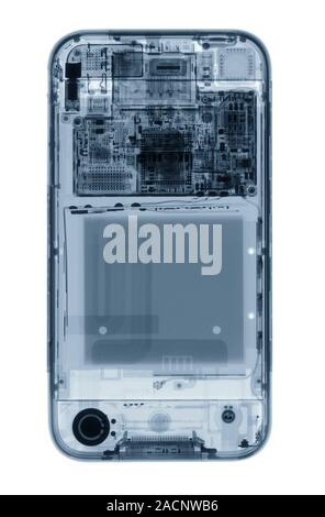 Mobile phone. Coloured X-ray of a mobile phone, showing its internal structure. Stock Photo