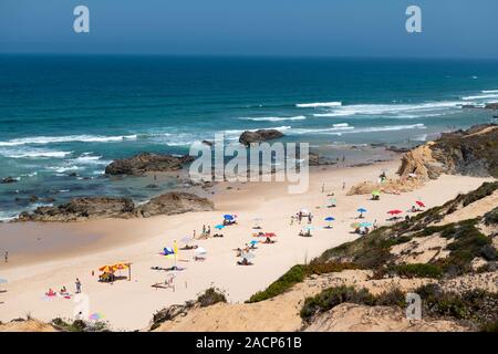 Porto Covo, Portugal - July 19, 2019: People at the Malhao Beach (Praia do Malhao) in Porto Covo, in Alentejo, Portugal. Stock Photo