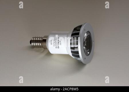 LED lightbulb. LEDs (light-emitting diodes) use about one tenth of the energy for a given light output when compared with normal incandescent bulbs, i Stock Photo
