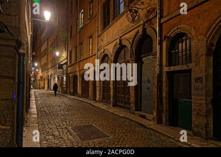 LYON, FRANCE, December 2, 2019 : Winter night in the old district of Vieux-Lyon streets. Stock Photo