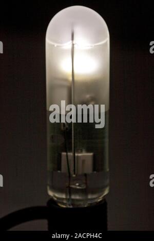 Liquid-cooled LED bulb. LED light bulbs are solid-state lamps that use light-emitting diodes (LEDs), as opposed to the tungsten filament of an incande Stock Photo