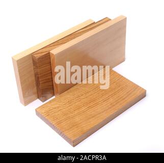 Three vertical boards (elm, acacia, lime) ang one horizontal board (oak) Stock Photo