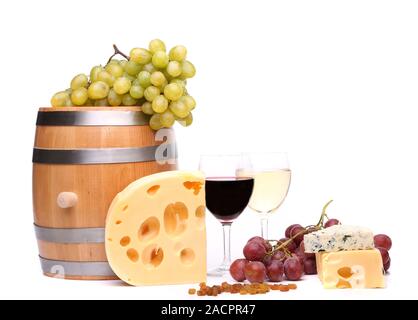 barrel, cheeses, glasses of wine and ripe grapes on wooden Stock Photo