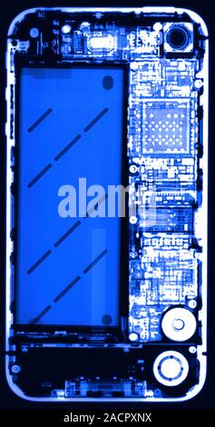X-ray of an iPhone 4, showing the internal structure. The iPhone 4 mobile phone was introduced on 24 June 2010. It is a 'smart phone', having the abil Stock Photo
