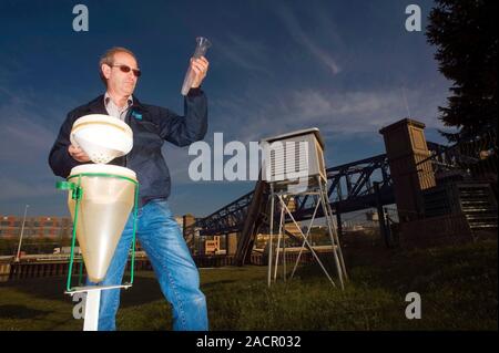 Weather station. Meteorologist checking readings at a weather station. Photographed in Puteaux, Paris, France. Stock Photo