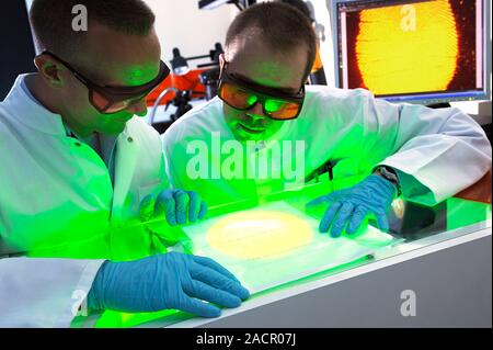Fingerprint research. Scientists working on a method of viewing fingerprints. Fingerprints are composed of amino acids, sebum, mineral salts and water Stock Photo