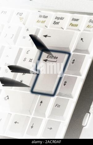 French computer keyboard. Close-up of a French keyboard with the enter key highlighted. Stock Photo