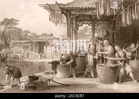 Dyeing and winding silk in China. 19th-century artwork of silk being dyed and wound in China. Silk is a fabric made from cocoons spun for the pupae of Stock Photo