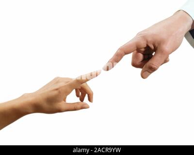 Outstretched fingers of male and female hands touching. Stock Photo