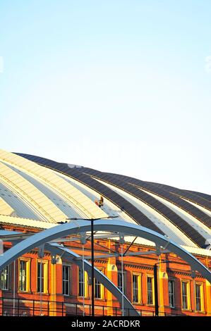 Maintenance men working on the roof of Manchester Central Conference and exhibition Centre Stock Photo